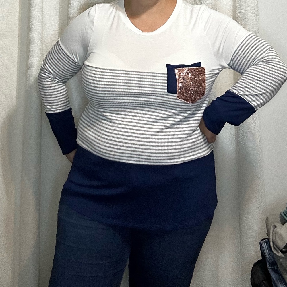 Long sleeve, great shacket top or wear alone.